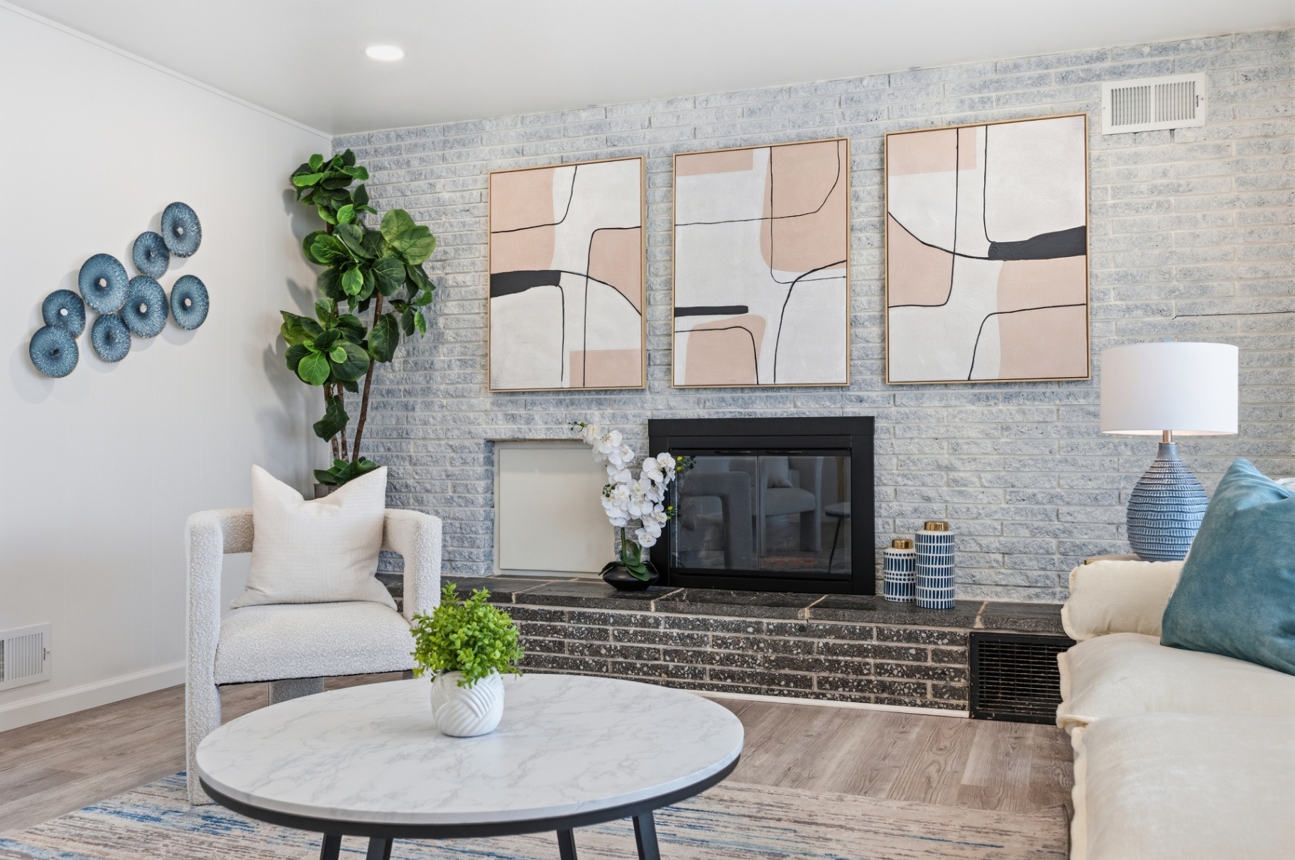 Whitewashed brick fireplace